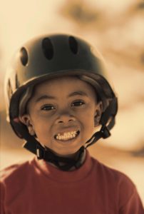 Child at dentist receiving dental treatment smiling in Maidstone, Kent