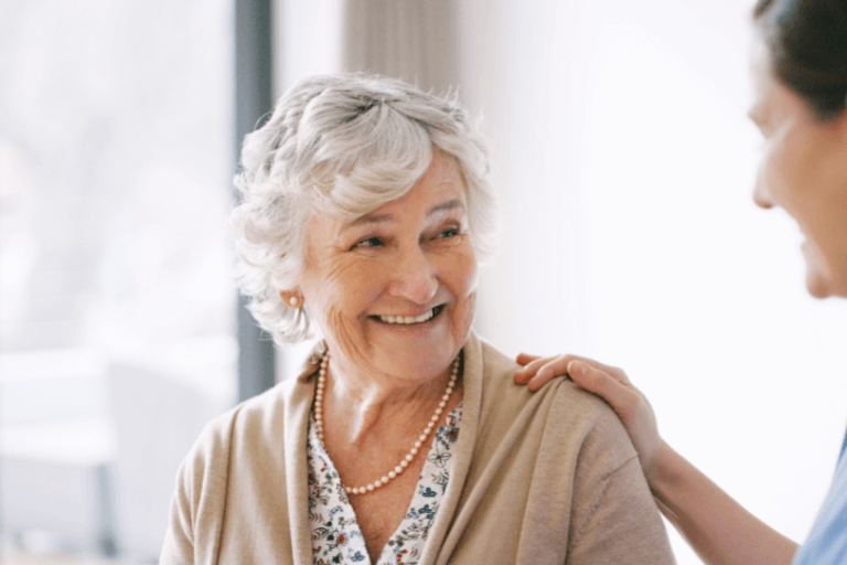 Old lady with dental implants in Maidstone, Kent