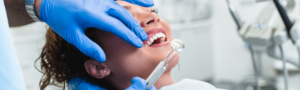 Woman during tooth implant appointment at Maidstone dental practice