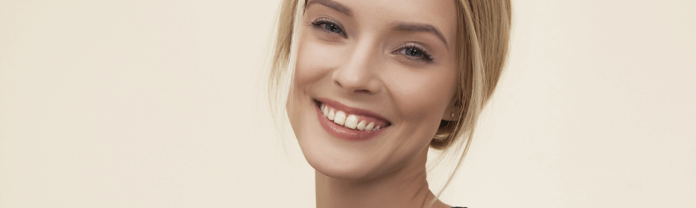 woman after braces treatment in maidstone, kent smiling